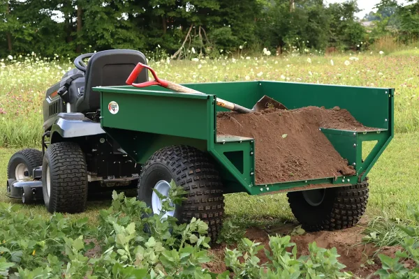 Single-axle Muts ATV dumper with a load of dirt